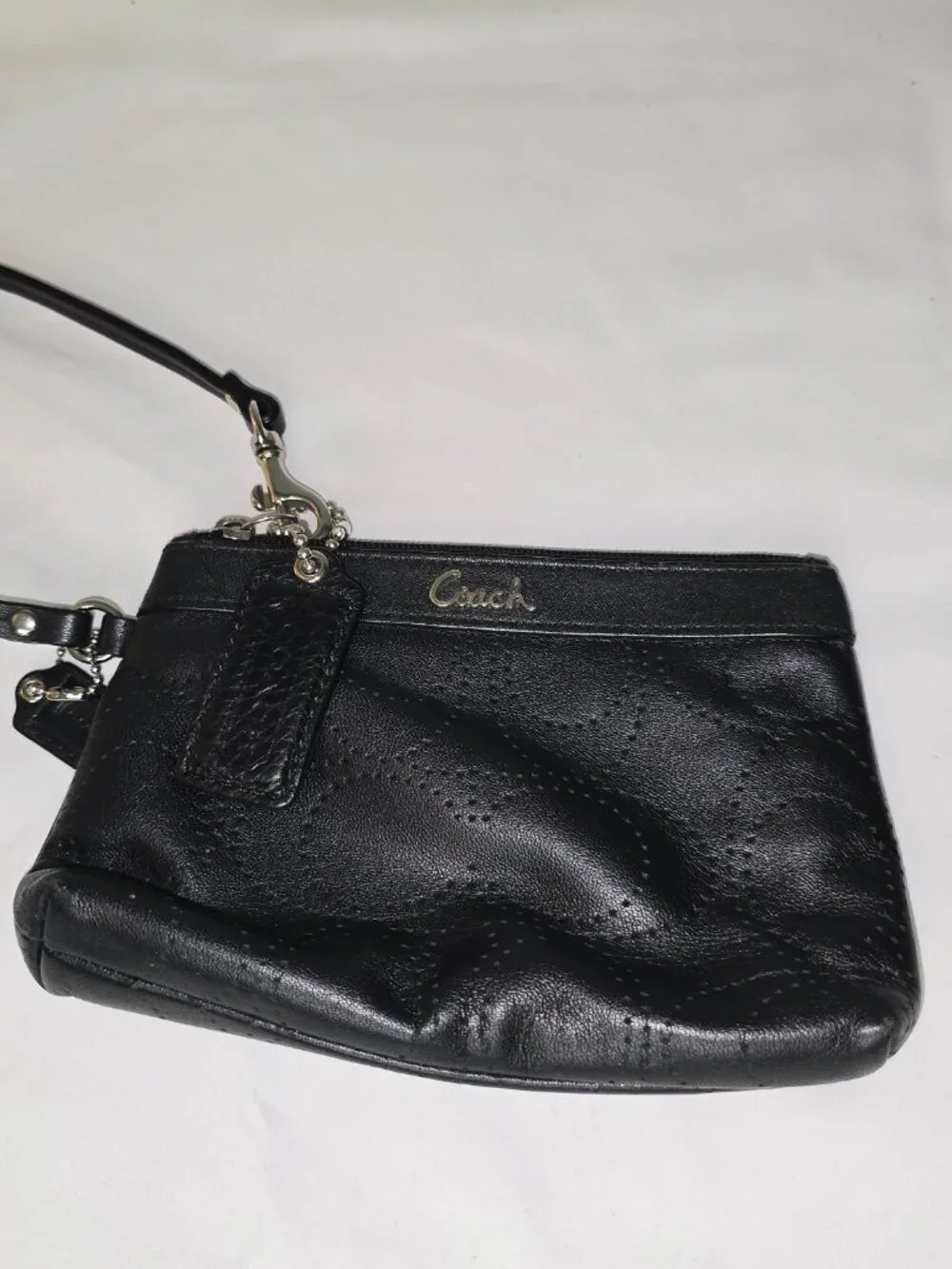 Coach signature perforated